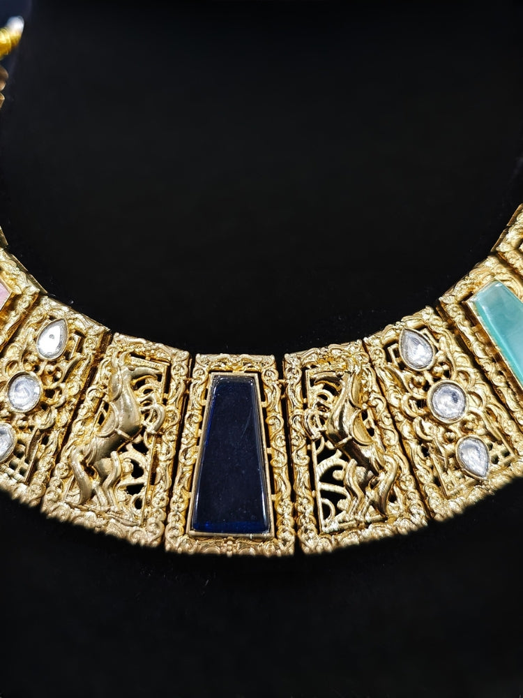 A glamorous artificial diamond and multi colored stone amrapali necklace paired with chic earrings, perfect for bridal wear. This high-quality artificial diamond jewelry set is the ideal choice for modern brides looking for a budget-friendly option with timeless sparkle.