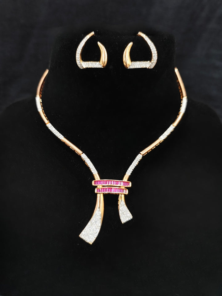 An elegant artificial diamond necklace and matching earrings. This premium artificial diamond jewelry set is perfect for special occasions, from Indian weddings to engagement parties, offering sophisticated glamour without the high price tag.