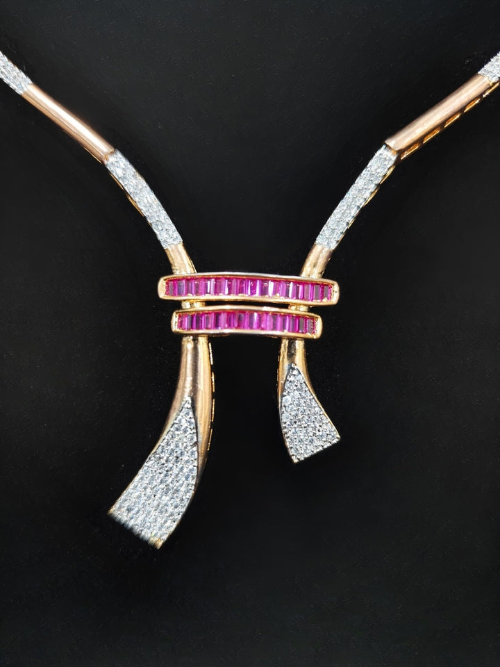 An elegant artificial diamond necklace and matching earrings. This premium artificial diamond jewelry set is perfect for special occasions, from Indian weddings to engagement parties, offering sophisticated glamour without the high price tag.