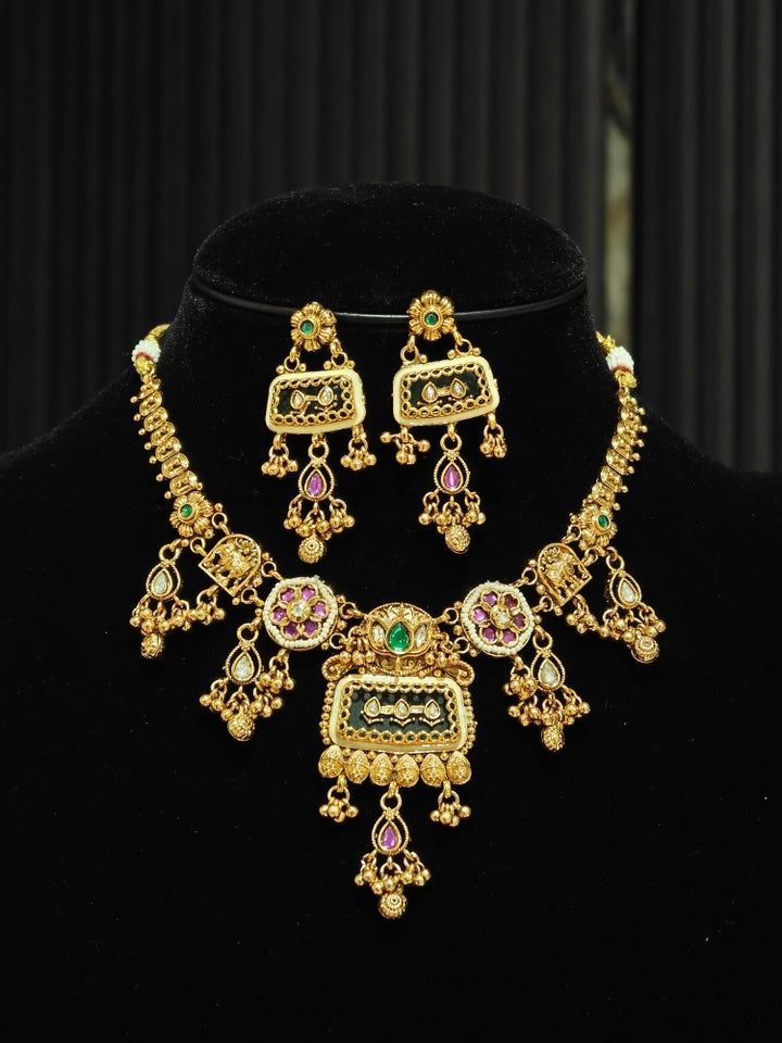 Gold Heritage necklace set with Kundan centre pendant and pink stone florets