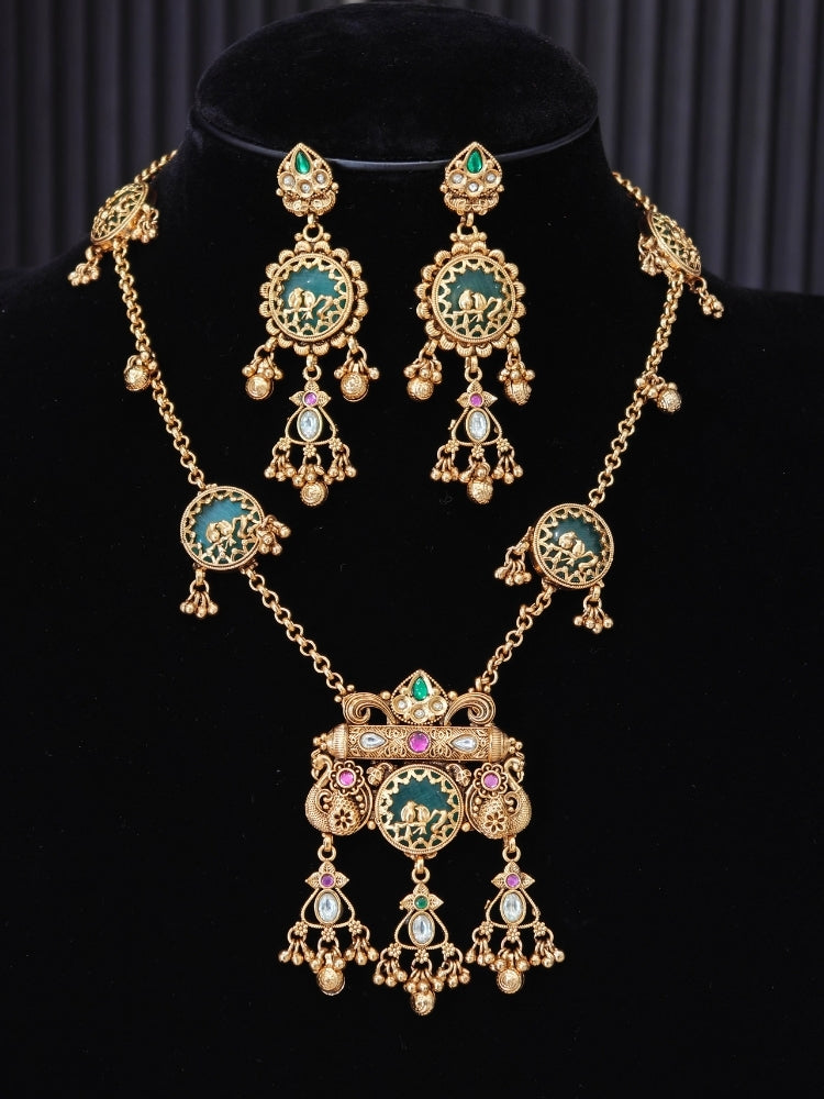 Antique gold Heritage necklace set with green bird-motif discs and Kundan pendant