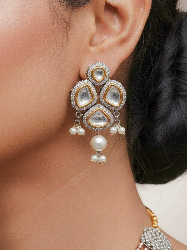 Close-up of a woman wearing an ornate traditional Mint Pink Long jewellery set and earrings with Kundan, American Diamond, pearls and Crystal Beads. Mehendi ceremony look completed with a handcrafted Kundan jewelry set. Wedding guest wearing a lightweight Kundan necklace for a Wedding function.